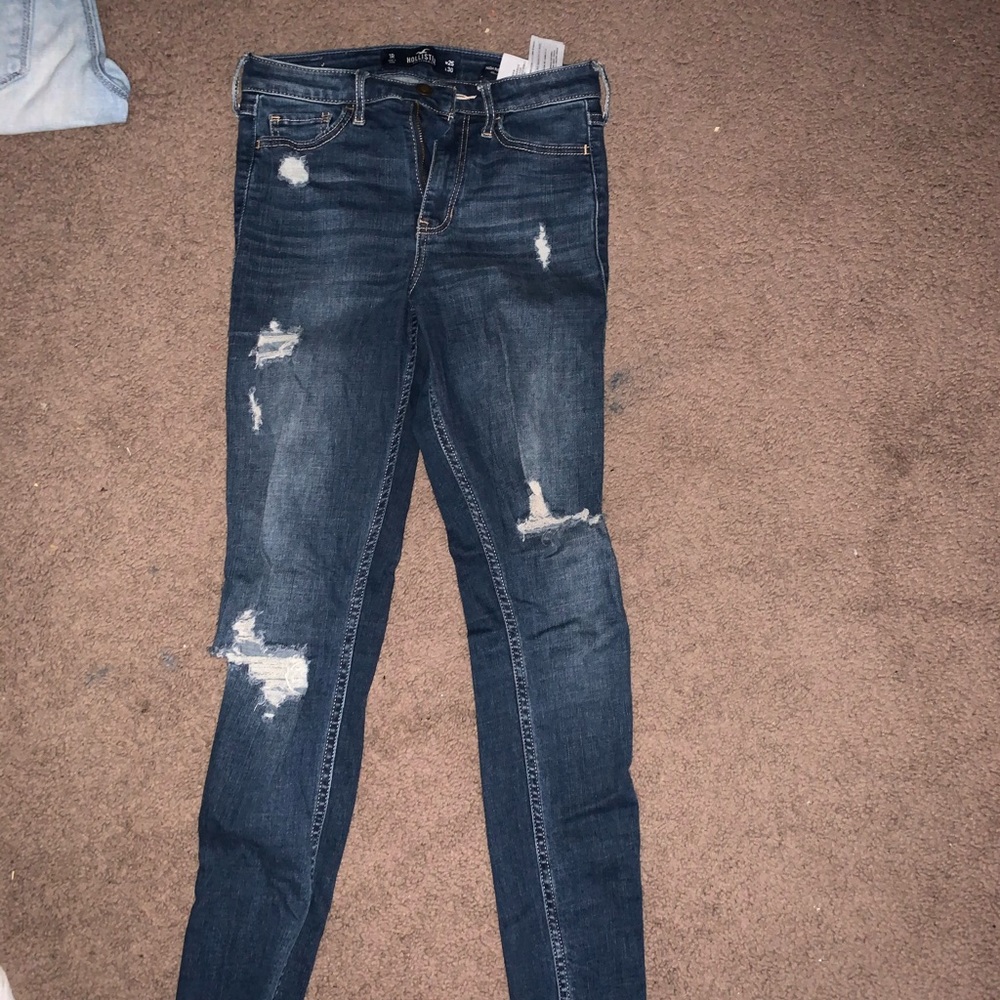 Navy blue ripped jeans